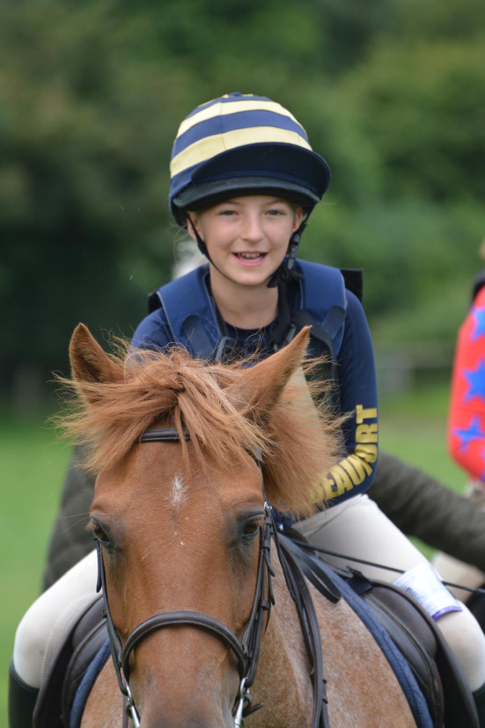 Rosie riding as a child