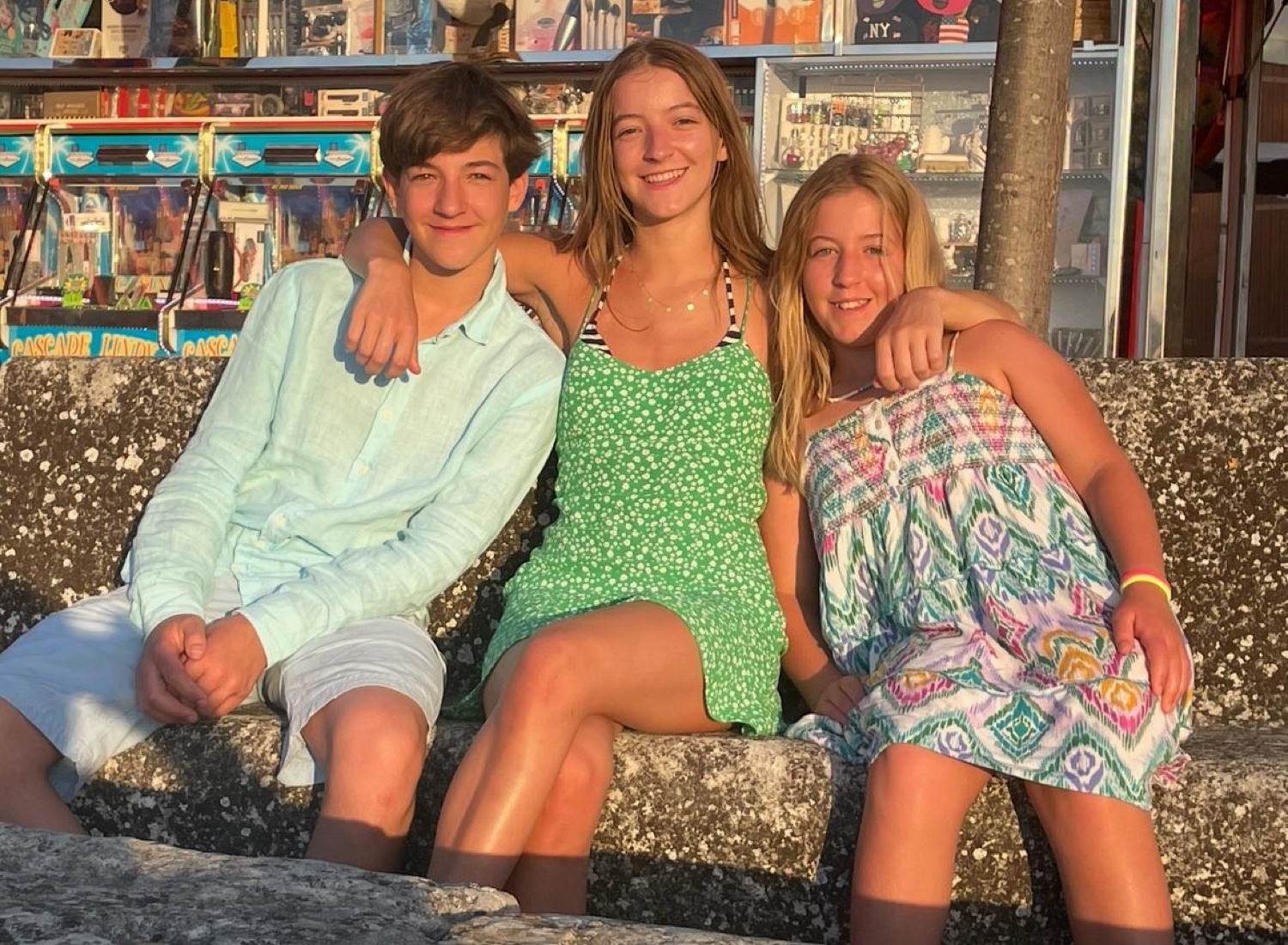 Rosie with her brother and sister at sunset