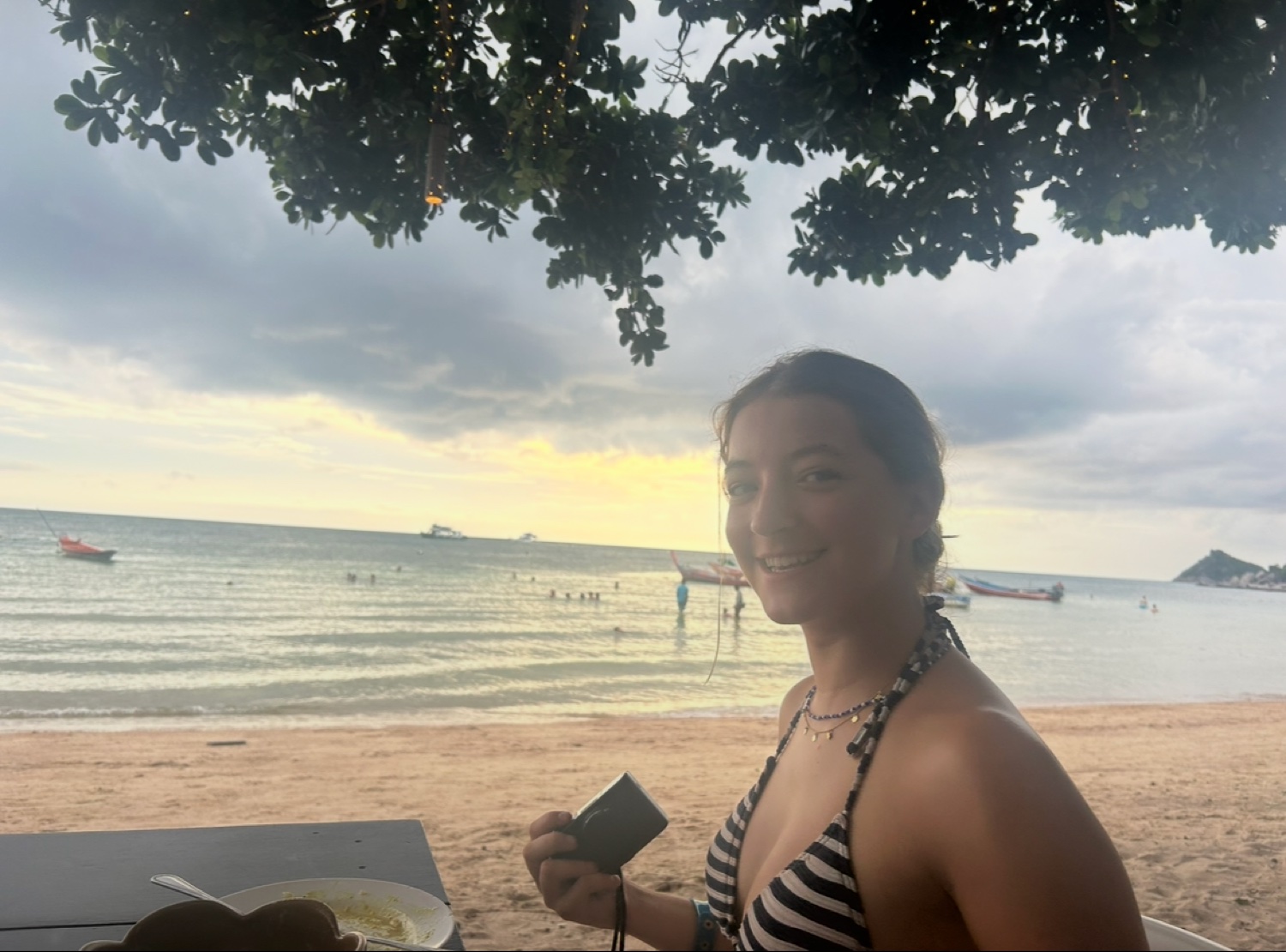 Rosie by the sea at sunset